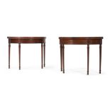 A PAIR OF GEORGE III MAHOGANY SEMI-ELLIPTICAL FOLDING TEA TABLES, CIRCA 1790