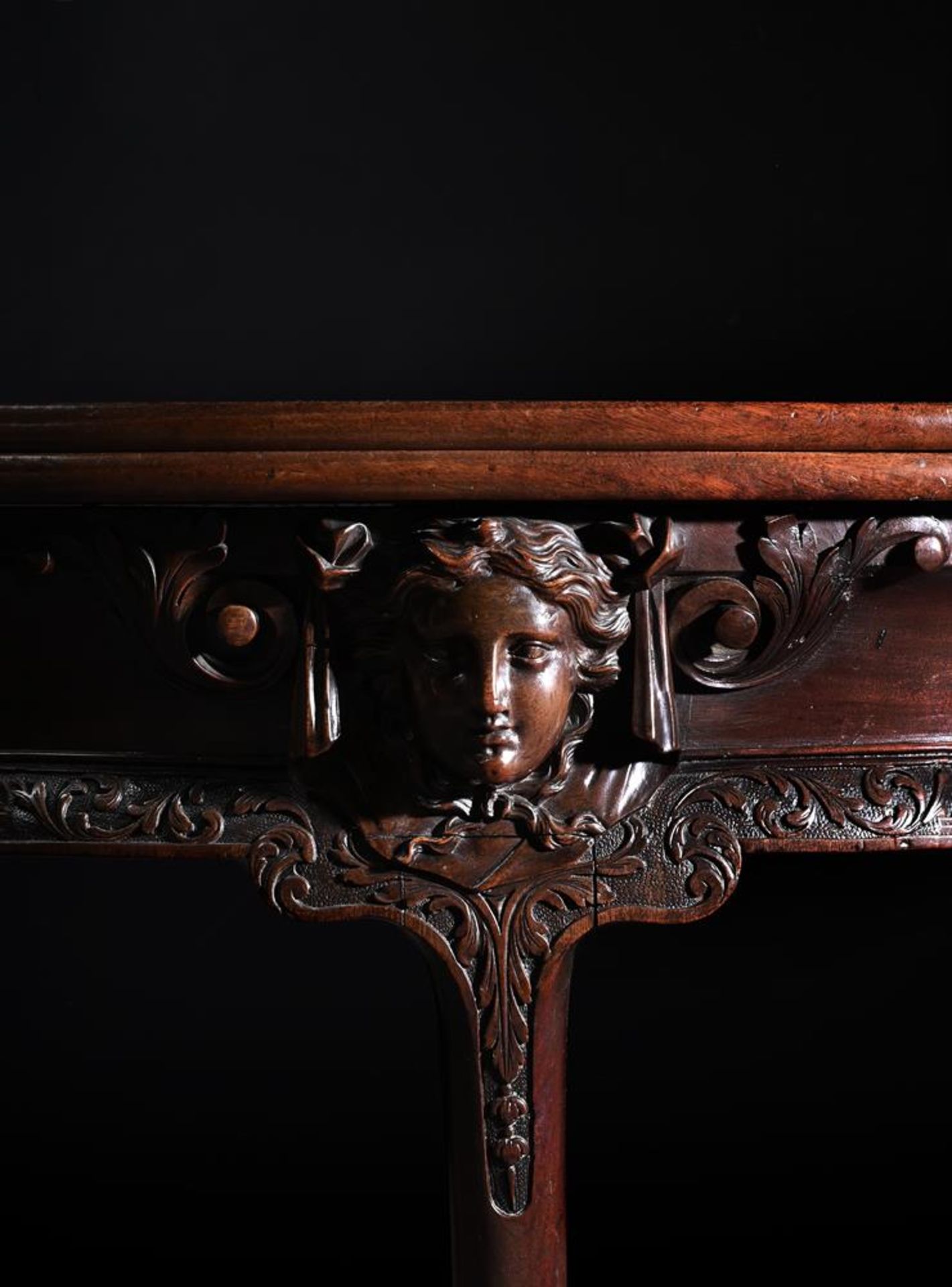 A GEORGE II CARVED MAHOGANY FOLDING TEA TABLE, CIRCA 1740-50