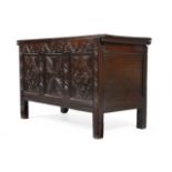 A CHARLES II CARVED OAK COFFER, CIRCA 1680