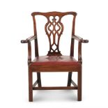 A GEORGE II MAHOGANY OPEN ARMCHAIR, IN THE MANNER OF THOMAS CHIPPENDALE, CIRCA 1765