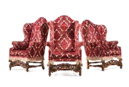 A SET OF THREE WALNUT WING ARMCHAIRS, IN WILLIAM & MARY STYLE,