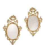 A PAIR OF CARVED GILTWOOD MIRRORSIN MID 18TH CENTURY STYLE