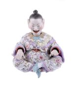 A MEISSEN ARTICULATED FIGURE OF A SEATED CHINESE FIGURE, LATE 19TH CENTURY