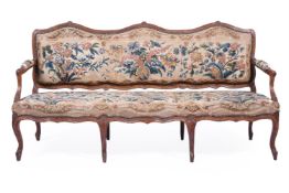 A CARVED OAK AND UPHOLSTERED SETTEE, LATE 18TH OR EARLY 19TH CENTURY