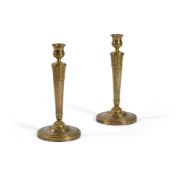 A PAIR OF EMPIRE ORMOLU CANDLESTICKS, FRENCH, EARLY 19TH CENTURY