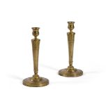 A PAIR OF EMPIRE ORMOLU CANDLESTICKS, FRENCH, EARLY 19TH CENTURY