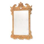 A GEORGE II CARVED GILT GESSO MIRROR, CIRCA 1730-40