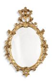 A GEORGE III CARVED GILTWOOD WALL MIRROR, CIRCA 1760