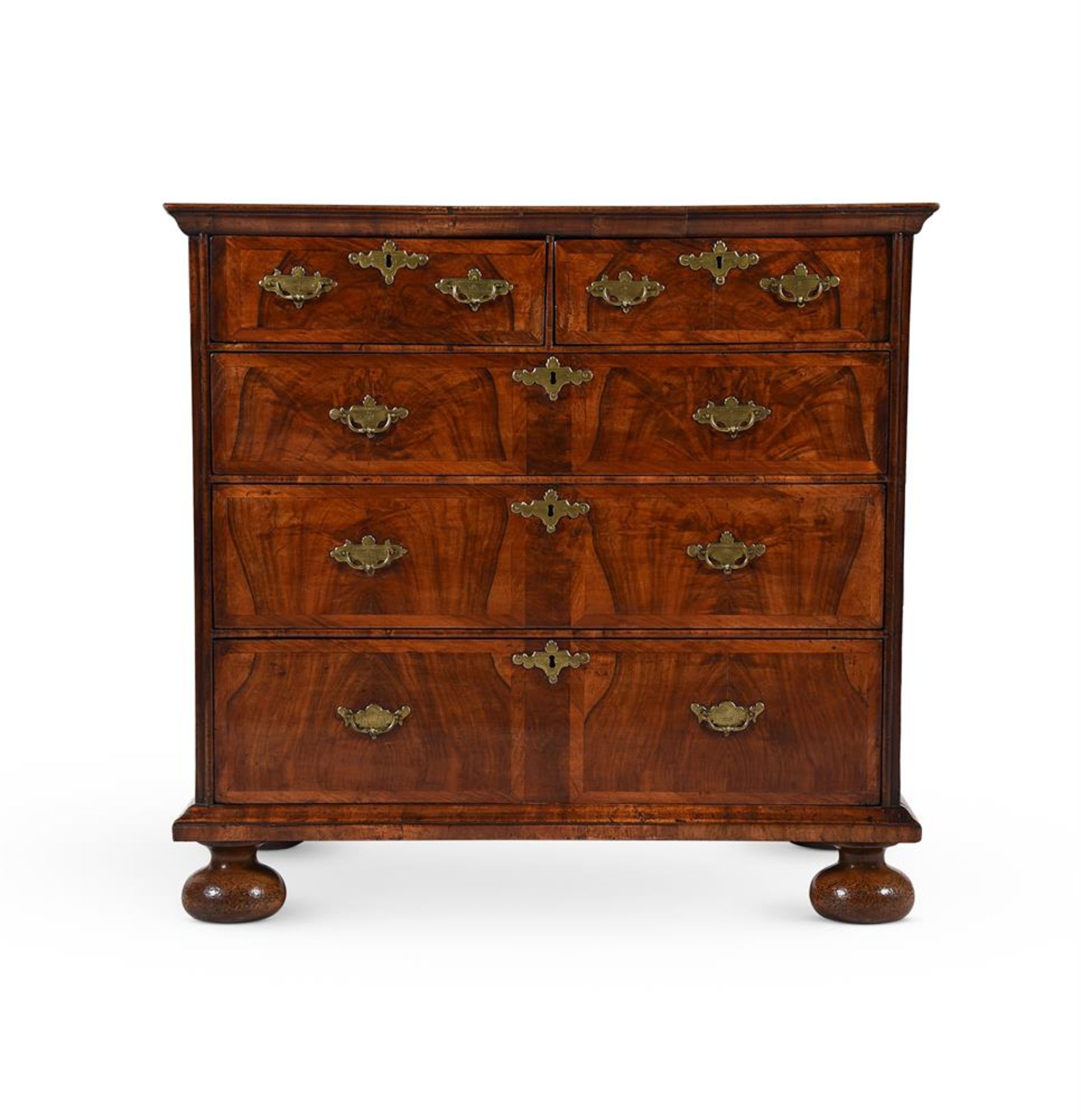 A QUEEN ANNE FIGURED WALNUT AND FEATHER-BANDED CHEST OF DRAWERS, CIRCA 1710