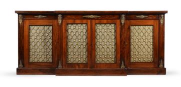 Y A GEORGE IV ROSEWOOD AND GILT METAL MOUNTED BREAKFRONT SIDE CABINET, CIRCA 1825
