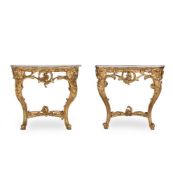A PAIR OF LOUIS XV STYLE GILTWOOD AND GESSO CONSOLE TABLES, FIRST HALF 19TH CENTURY