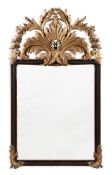 A WALNUT AND CARVED GILTWOOD MIRROR, PROBABLY ITALIAN, IN 18TH CENTURY STYLE, 20TH CENTURY