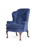 A GEORGE II OAK AND UPHOLSTERED WING ARMCHAIRCIRCA 1740 121cm high