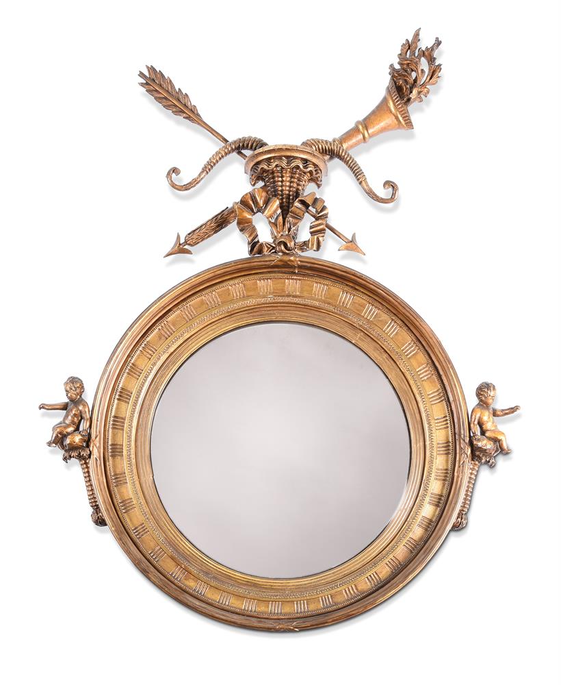 A CARVED GILTWOOD AND GESSO CIRCULAR CONVEX MIRROR, 19TH CENTURY