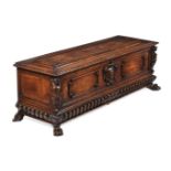 AN ITALIAN CARVED WALNUT AND INLAID CASSONE, EARLY 17TH CENTURY AND LATER ELEMENTS