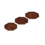 A RARE SET OF THREE GEORGE III MAHOGANY GRADUATED OCTAGONAL TRAYS, 18TH CENTURY