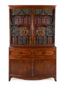Y A REGENCY MAHOGANY BOWFRONT SECRETAIRE BOOKCASE, IN THE MANNER OF GILLOWS, CIRCA 1820