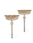 A PAIR OF CONTINENTAL GREEN PAINTED AND SILVERED CONSOLE TABLES, LATE 18TH OR EARLY 19TH CENTURY