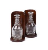 A NEAR PAIR OF REGENCY MAHOGANY BOTTLE STANDS OR WINE SHIELDS CIRCA 1820 Of concave form