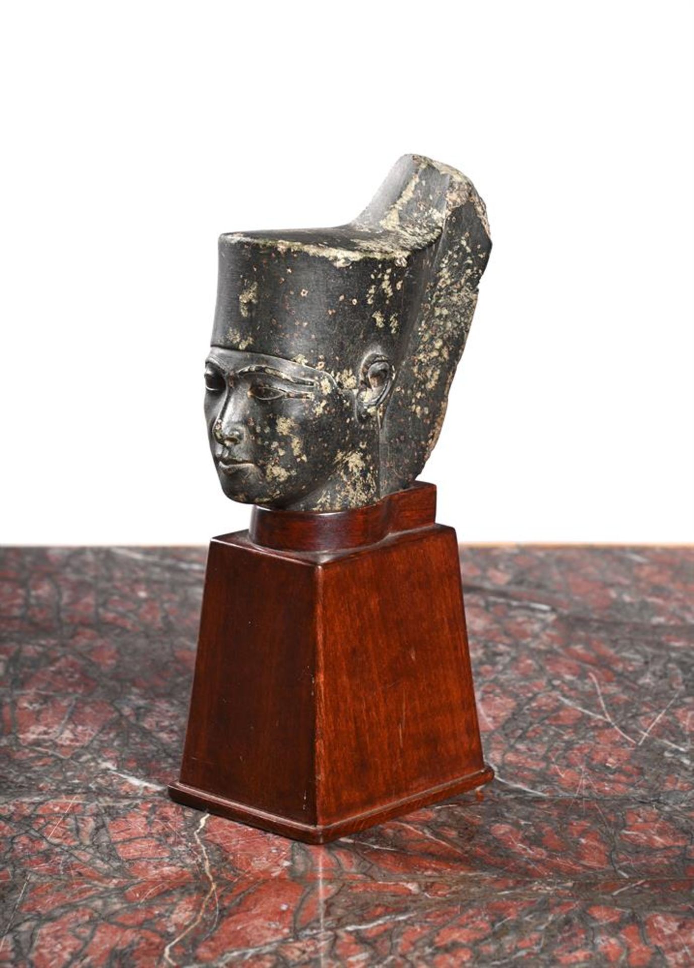 AFTER THE ANTIQUE, A MARBLE BUST FRAGMENT OF A PHAROAH'S HEAD, 19TH CENTURY OR EARLIER