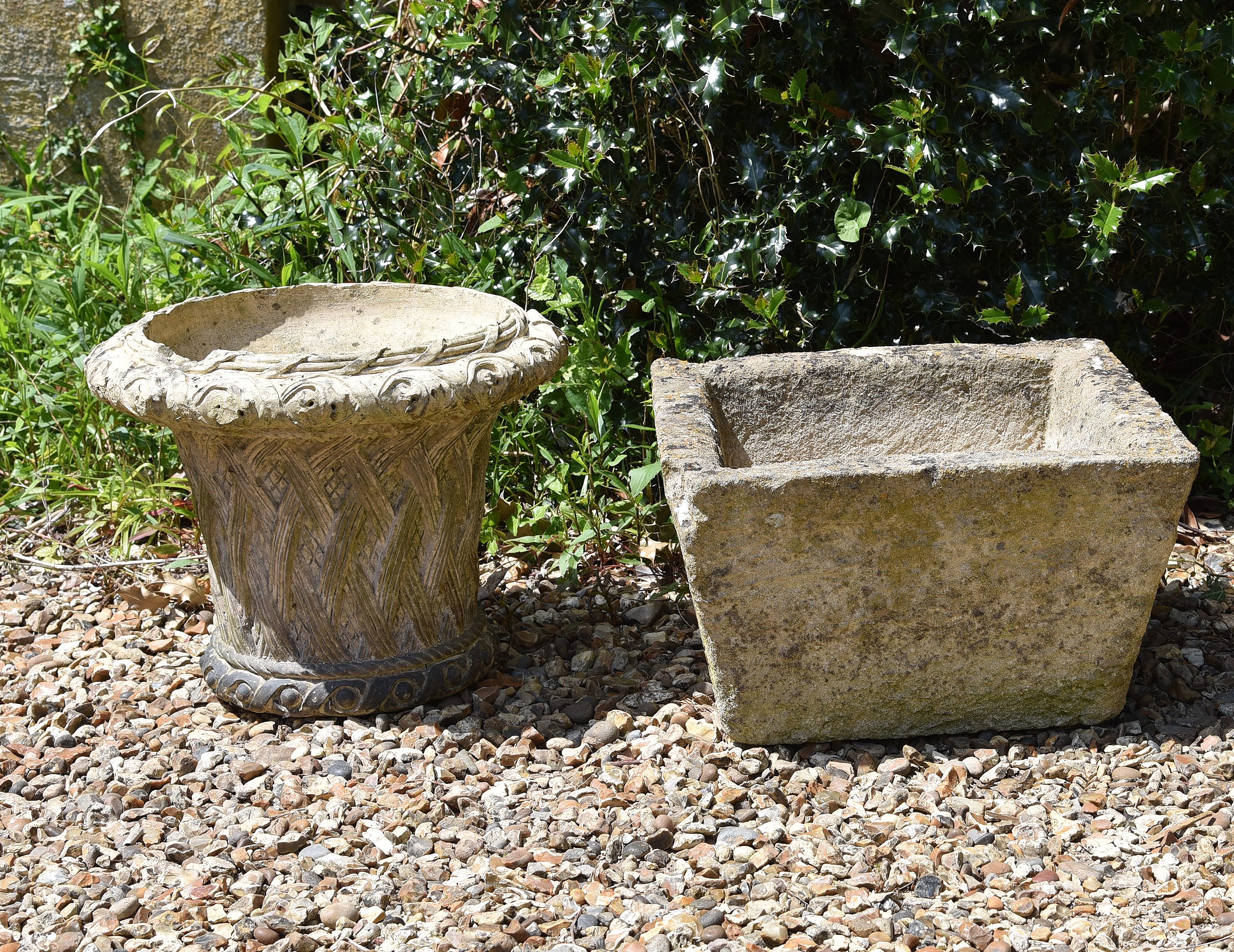 A COTSWOLD STONE SQUARE TAPERING POT, 19TH OR EARLY 20TH CENTURY