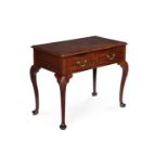 A GEORGE II IRISH 'FIDDLEBACK' MAHOGANY SIDE OR DRESSING TABLE, CIRCA 1755