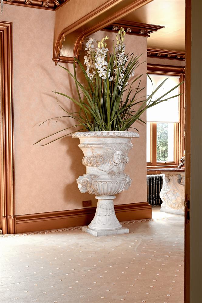 A MONUMENTAL PAIR OF CARVED MARBLE URNS, AFTER THE ANTIQUE, CONTEMPORARY