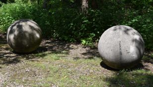 ANOTHER LARGE PAIR OF STONE COMPOSITION BALLS, 20TH CENTURY