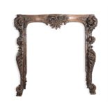 A LARGE FLEMISH OAK CARVED FIRE SURROUND, 18TH OR 19TH CENTURY