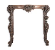 A LARGE FLEMISH OAK CARVED FIRE SURROUND, 18TH OR 19TH CENTURY