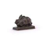 AN ENGLISH SCHOOL BRONZE MODEL OF RABBIT