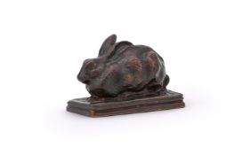 AN ENGLISH SCHOOL BRONZE MODEL OF RABBIT