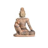 A LARGE TERRACOTTA SEATED FIGURE OF A MALE DEITY, PROBABLY 19TH OR EARLY 20TH CENTURY