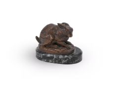 ALFRED DUBUCAND (FRENCH, 1828-1894), A BRONZE MODEL OF A CROUCHING HARE