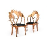 Y A PAIR OF EUROPEAN FALLOW HORN 'ANTLER' AND COWHIDE CHAIRS BY ANTHONY REDMILE