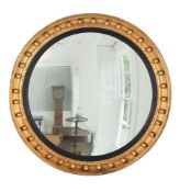 A LARGE GILTWOOD CONVEX WALL MIRROR, IN REGENCY STYLE, LATE 20TH CENTURY