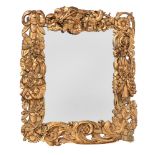 A SMALL CARVED GILTWOOD WALL MIRROR, OF SUNDERLAND TYPE, CIRCA 1680 AND LATER