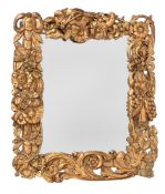A SMALL CARVED GILTWOOD WALL MIRROR, OF SUNDERLAND TYPE, CIRCA 1680 AND LATER