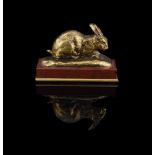 ANTOINE-LOUIS BARYE (FRENCH, 1795-1875), A GILT BRONZE MODEL OF A CROUCHING RABBIT