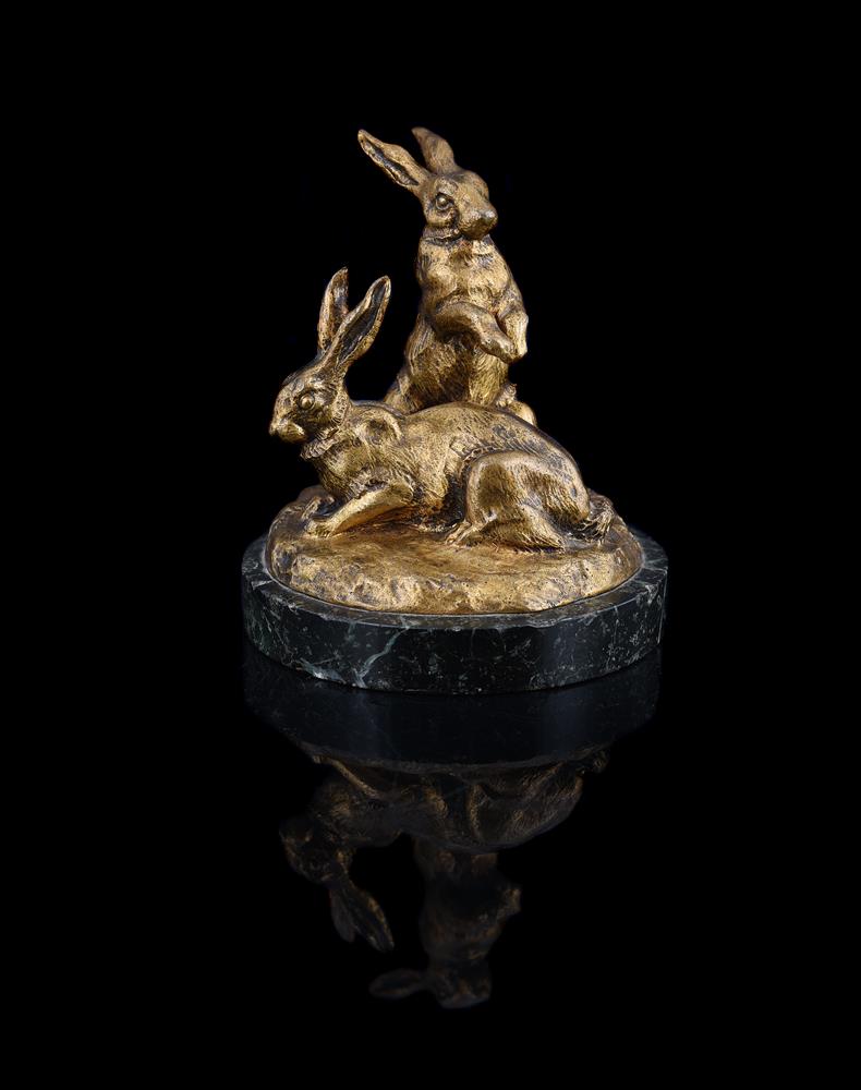 M PAIGNANT (FRENCH, LATE 19TH/EARLY 20TH CENTURY), A GILT BRONZE MODEL OF TWO RABBITS