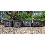 A SET OF FOUR SQUARE LEAD PLANTERS, 20TH CENTURY
