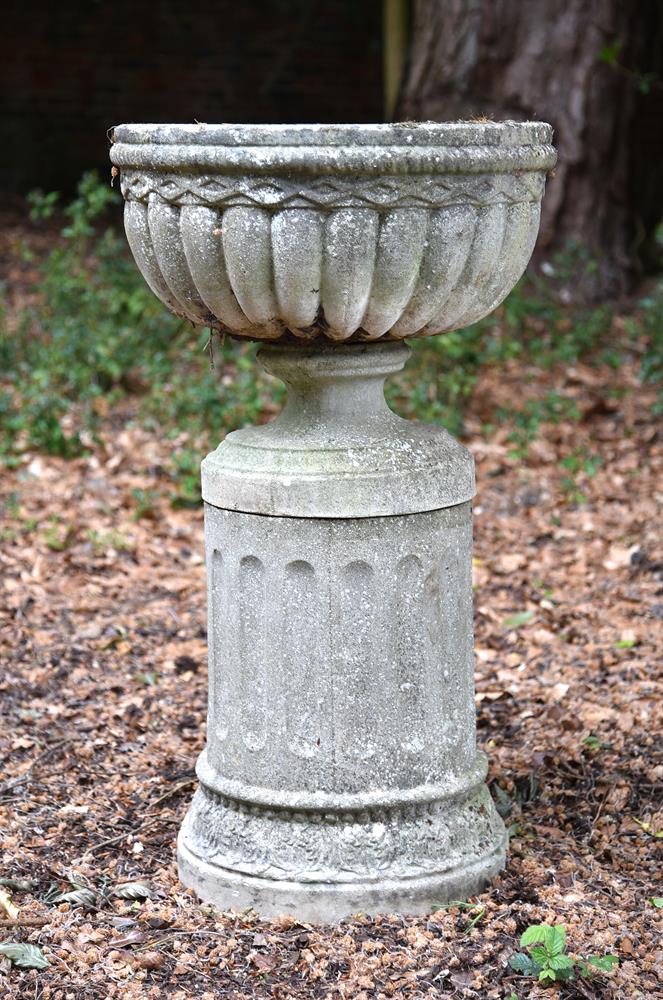 A STONE COMPOSITION CENTREPIECE ON PEDESTAL, IN REGENCY STYLE, 20TH CENTURY