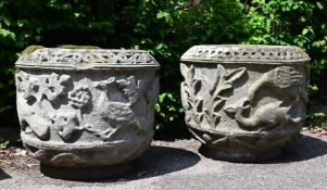 A NEAR PAIR OF CARVED STONE GARDEN POTS OR PLANTERS, LATE 19TH OR EARLY 20TH CENTURY