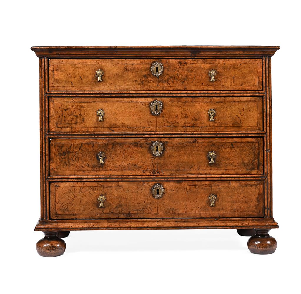 A QUEEN ANNE BURR WALNUT AND CROSSBANDED CHEST OF DRAWERS, CIRCA 1710