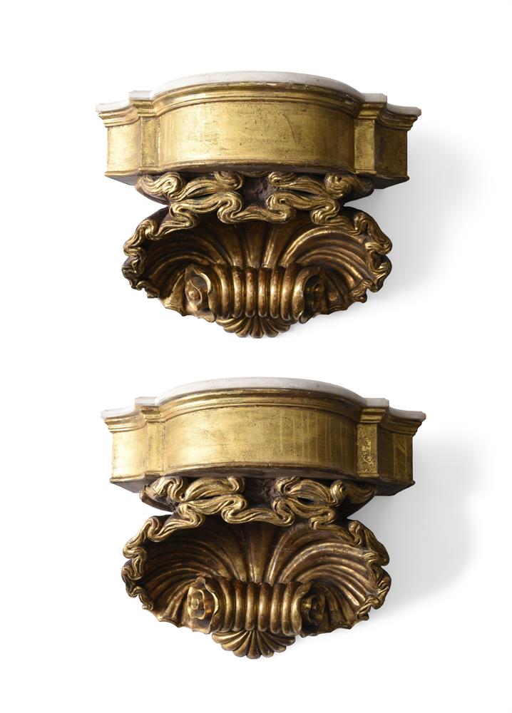 A PAIR OF ITALIAN CARVED GILTWOOD AND WHITE MARBLE WALL BRACKETS, 19TH CENTURY AND LATER