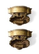 A PAIR OF ITALIAN CARVED GILTWOOD AND WHITE MARBLE WALL BRACKETS, 19TH CENTURY AND LATER
