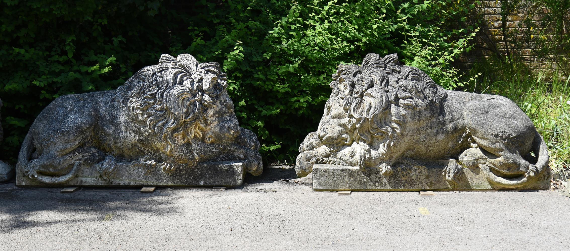 A LARGE PAIR OF ITALIAN CARVED LIMESTONE FIGURES OF LIONS, LATE 20TH CENTURY