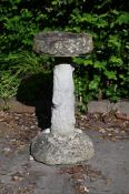 A CARVED PURBECK STONE BIRD BATH, EARLY 20TH CENTURY