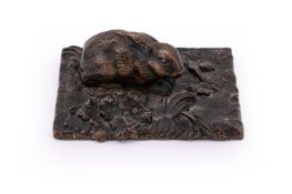 IN THE MANNER OF ANTOINE-LOUIS BARYE, A BRONZE MODEL OF A CROUCHING RABBIT