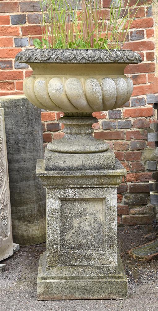 A PAIR OF LARGE STONE COMPOSITION VASES ON PLINTHS, IN REGENCY STYLE, 20TH CENTURY - Image 2 of 4